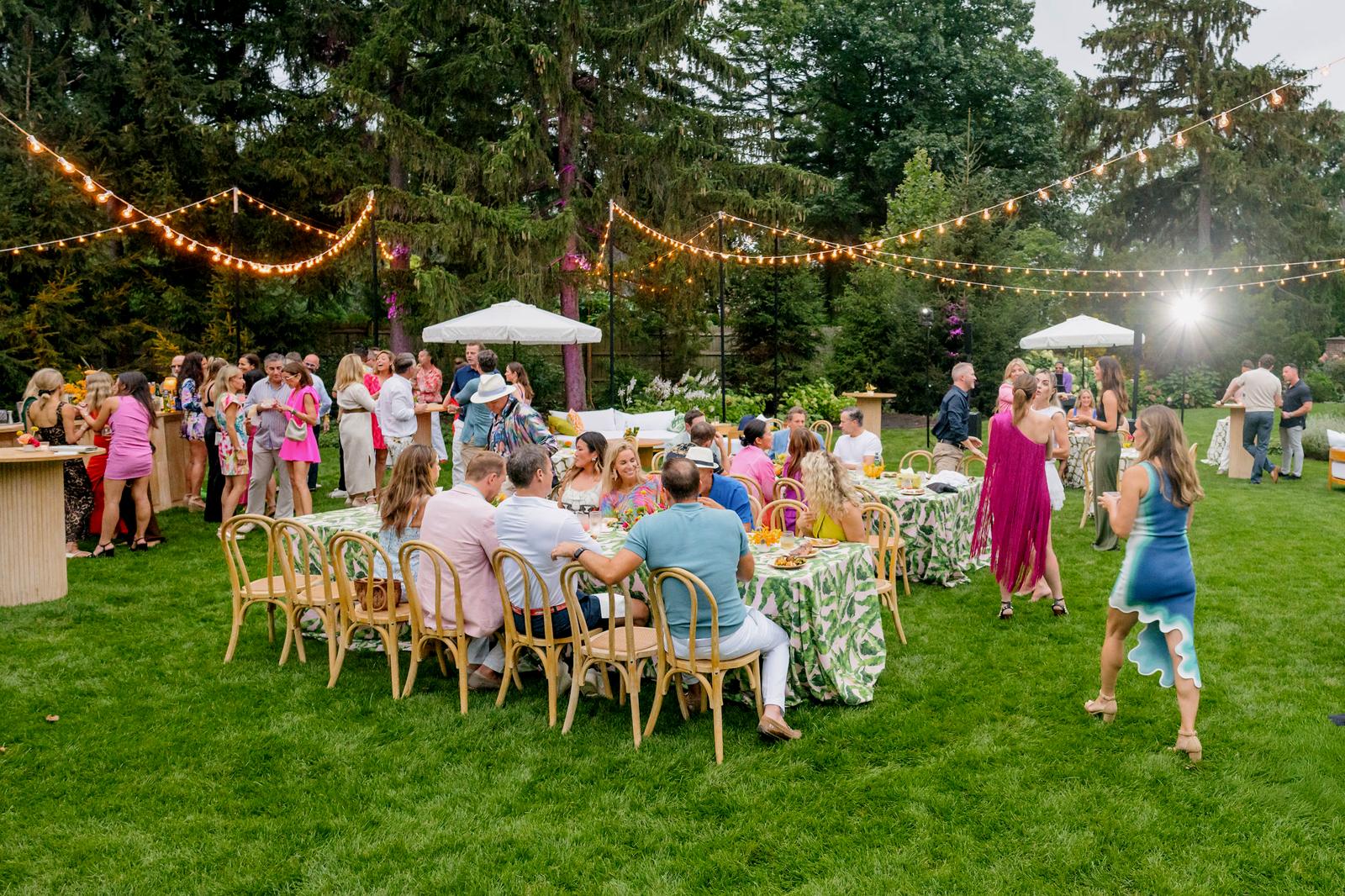 Guests at the long tables as dinner is served