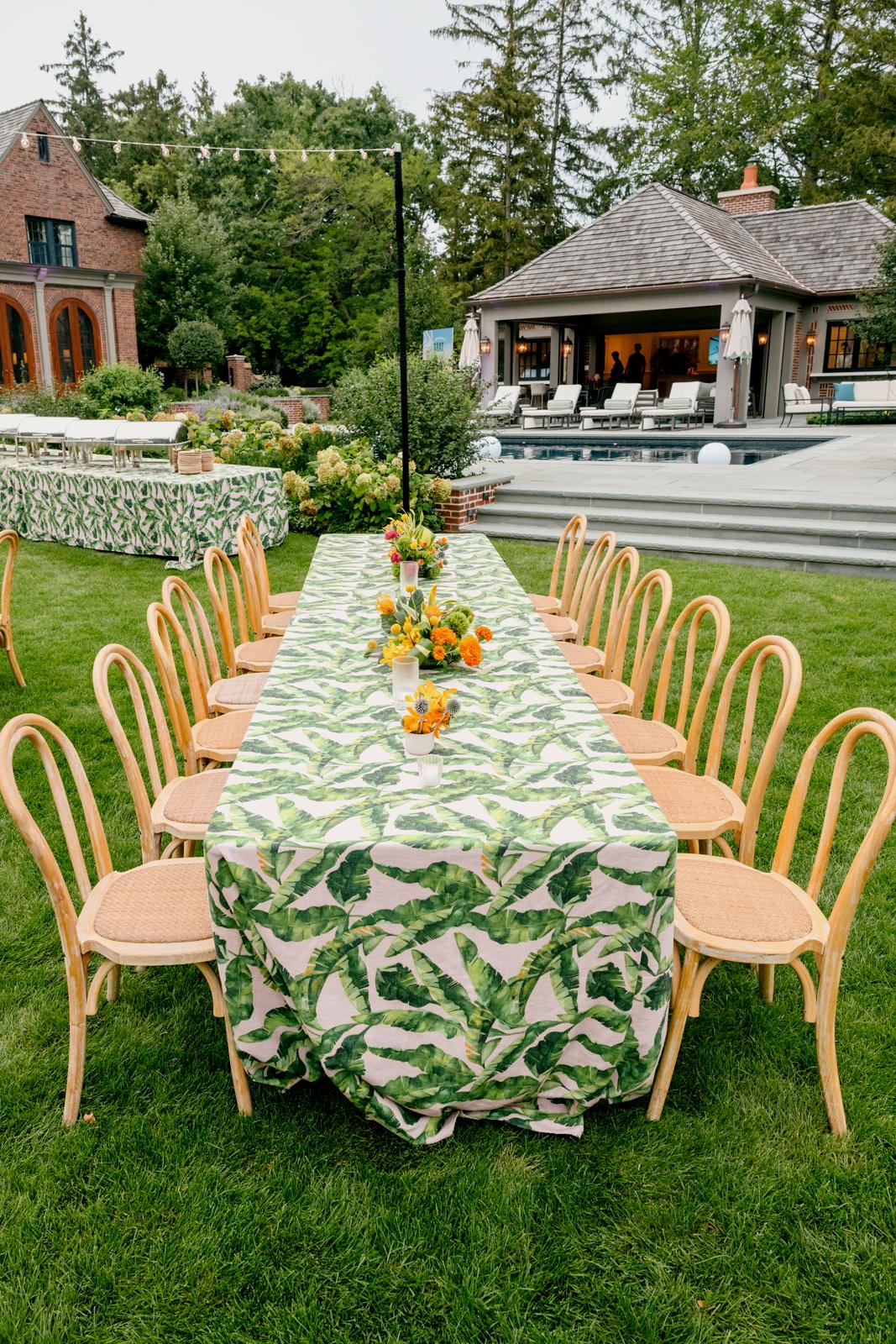 The long table dressed in banana leaf linens before guests arrive
