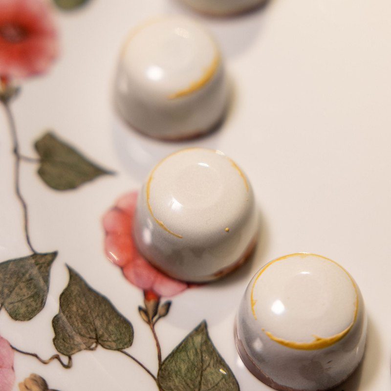 Tonka crème brûlée bonbons on floral china