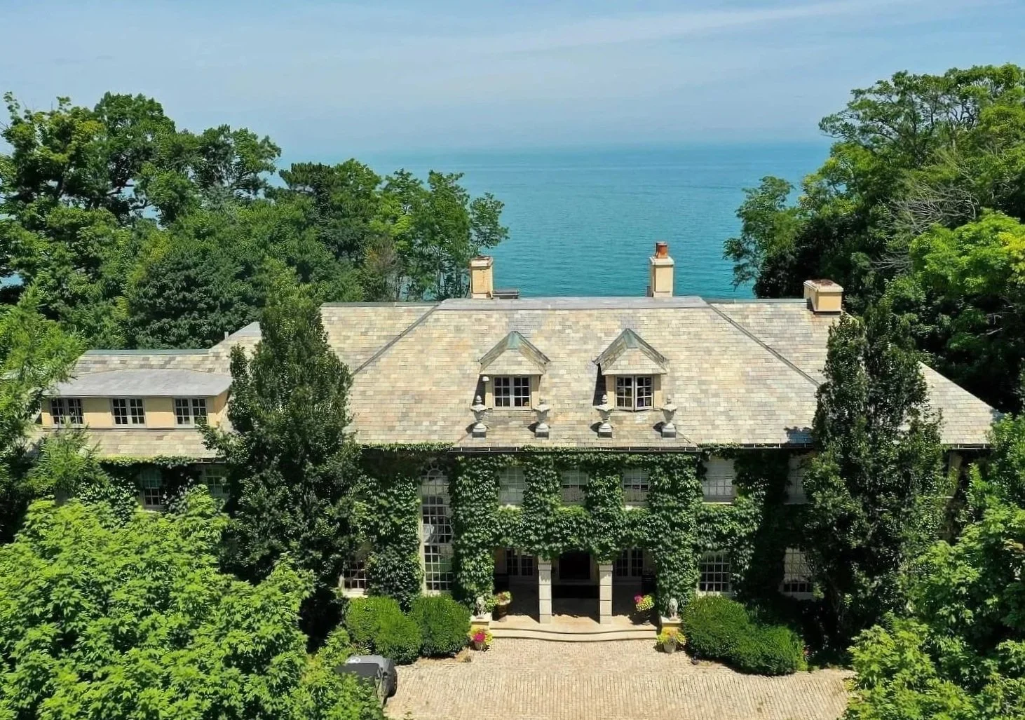 A stately North Shore home at dusk