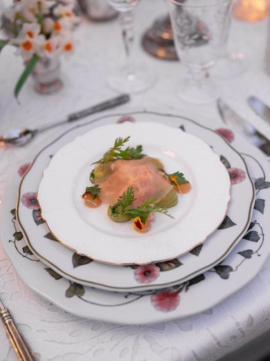 A plated course at an intimate rehearsal dinner