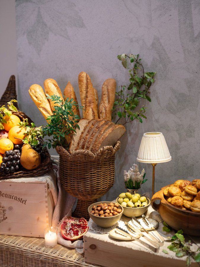 The wicker console table dressed for a morning spread